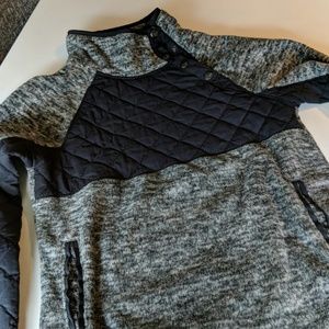 Assymetrical snap pullover